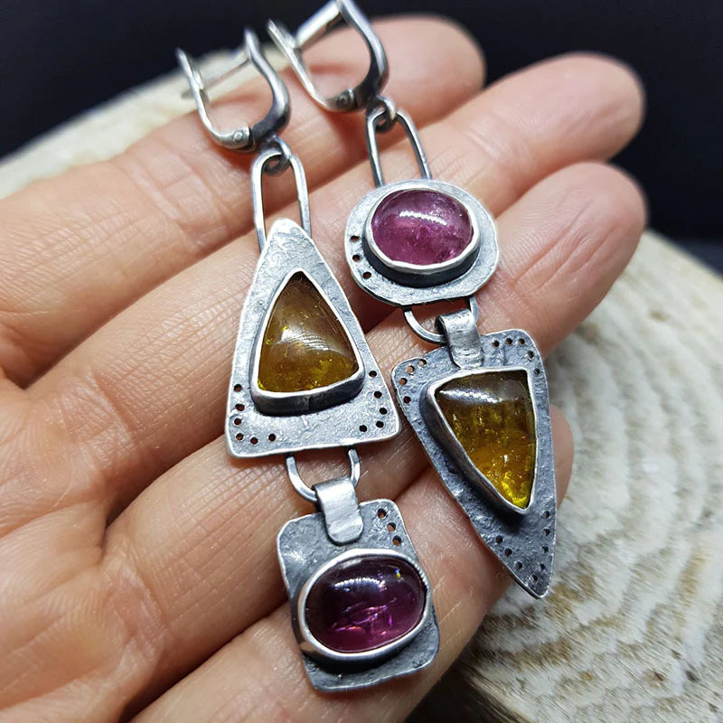 Eye-catching handmade earrings featuring natural gemstones and a vintage charm