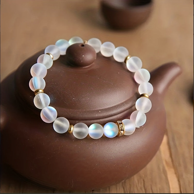 Bracelet made from iridescent moonstone beads with sparkling cubic zirconia details