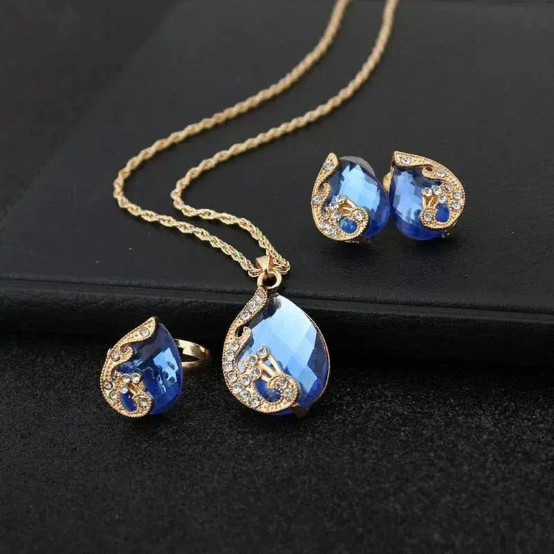 Sparkling Crystal Jewelry Set with Pendant, Ring, and Earrings