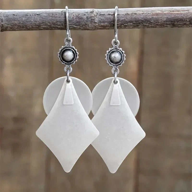 Elegant White Earrings with Diamond-Shaped Charms and Antique Setting