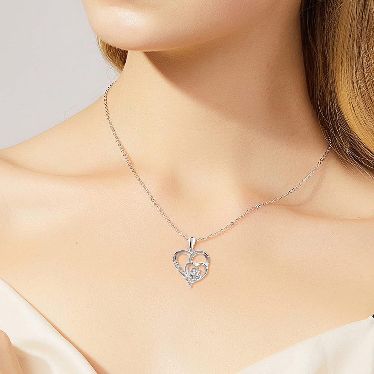 Heart and Paw Print Pendant with Sparkling Cubic Zirconia Crystals