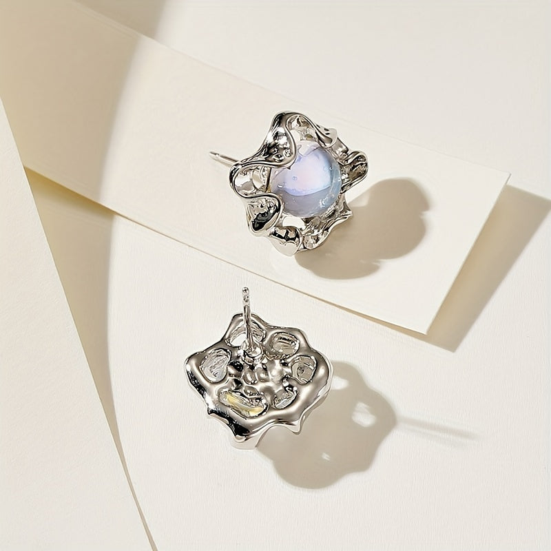 Moonstone earrings with an organic, wavy design