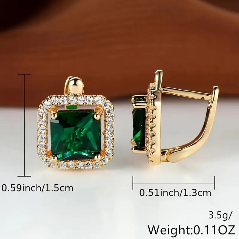 Glamorous earrings with square green cubic zirconia and a rhinestone crown