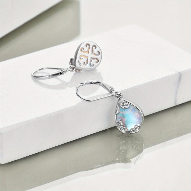 Elegant Dangle Earrings with Blue Moonstone and Celtic Accents