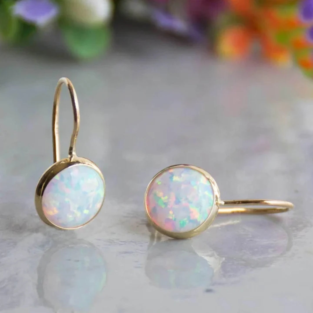 Round opal earrings with a vibrant play of colours