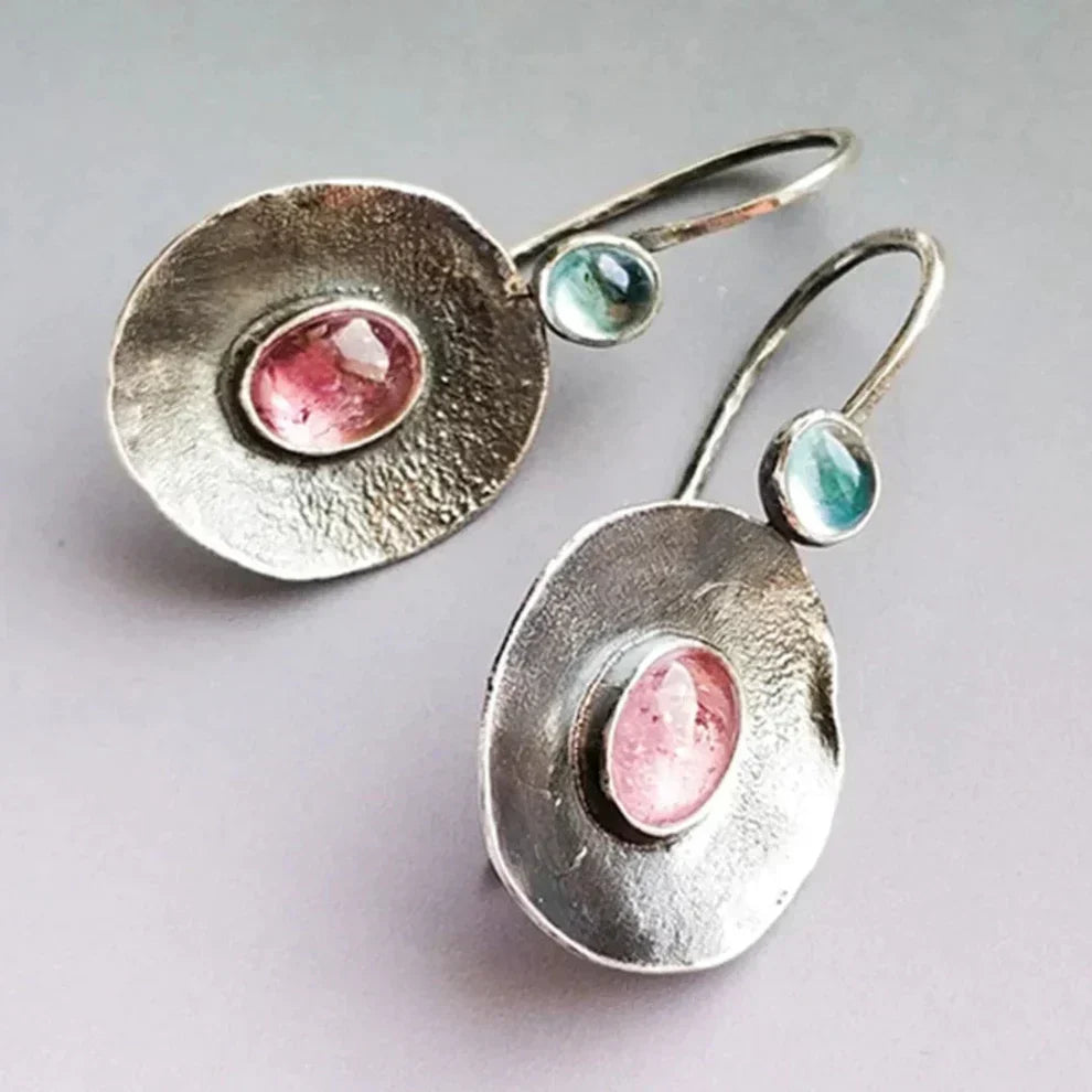 Oval gemstone earrings with a vintage feel and a unique design