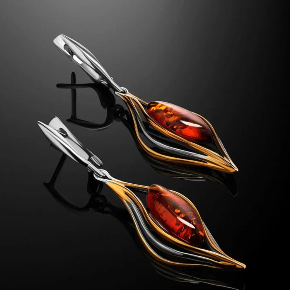 Elegant earrings featuring sparkling amber and a wavy design