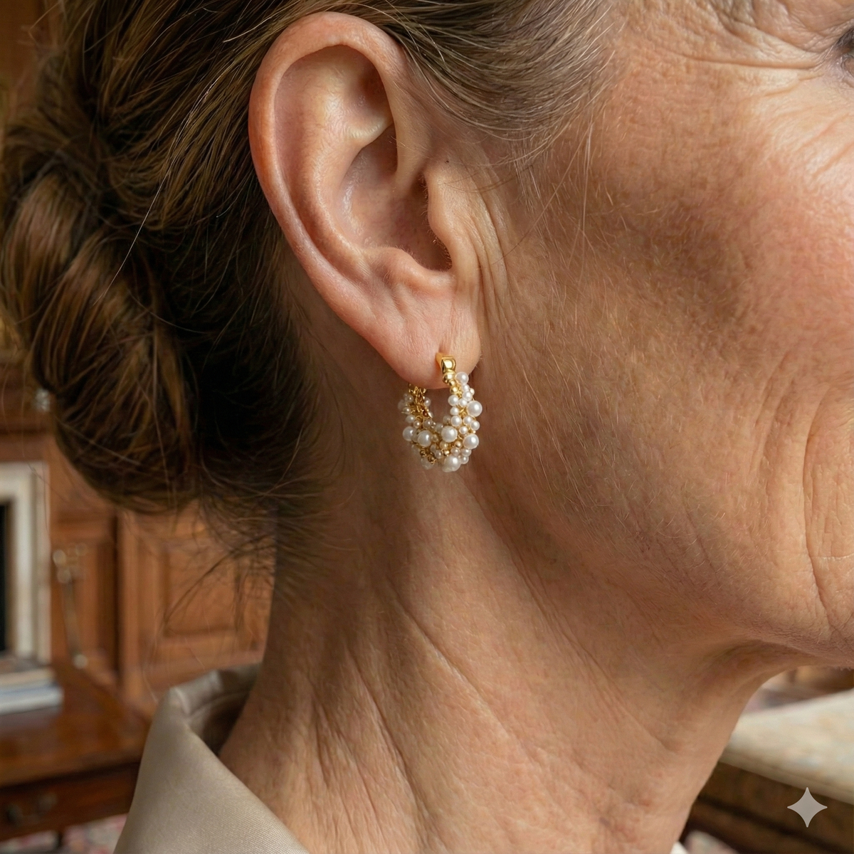 Vintage pearl hoop earrings with a shiny gold finish