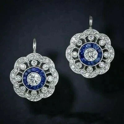 Elegant Sapphire and Diamond Earrings with Vintage Floral Halo Design