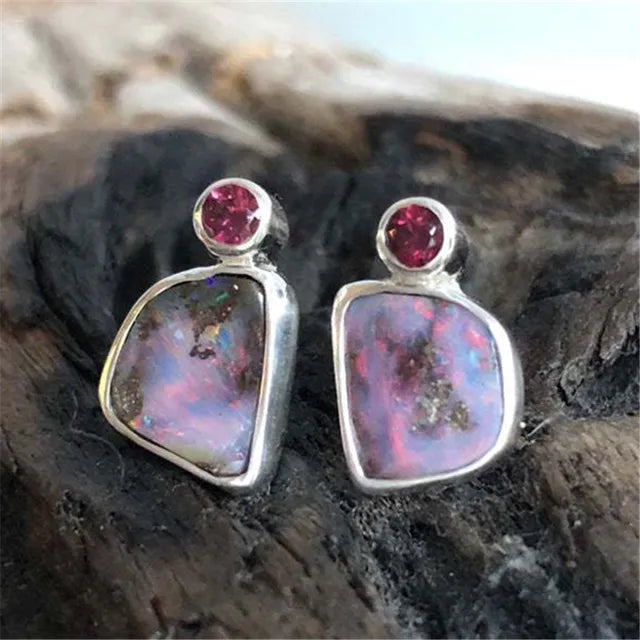 Unique purple opal earrings with sparkling rubies