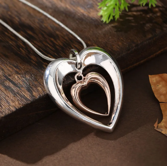 Two-Tone Heart Necklace with Delicate Interlocking Heart Pendant