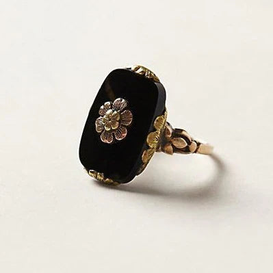 Vintage Ring with Black Stone and Gold Floral Details