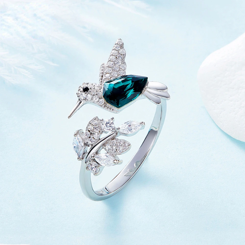 Adjustable Ring with Birds and Blue Zirconia