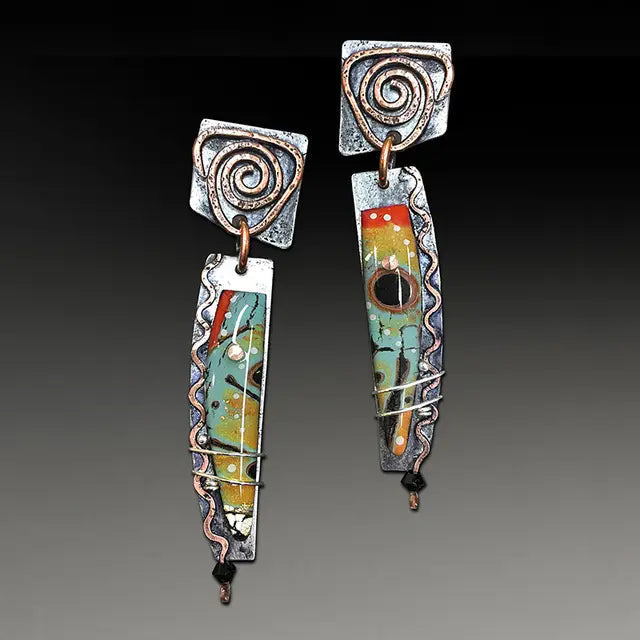 Handmade ethnic-style enamel earrings with ornate swirl-shaped details