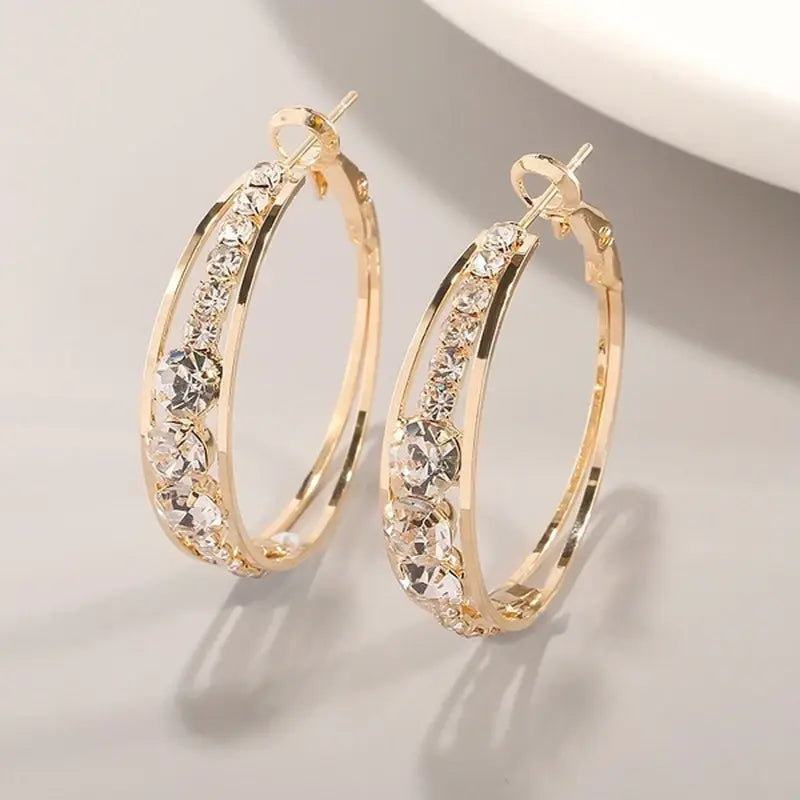 Women’s hoop earrings with brilliant-cut imitation diamonds and a double setting