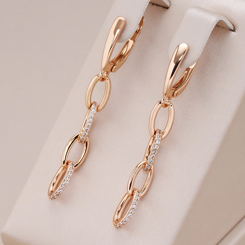 Elegant earrings with shiny chain links and sparkling cubic zirconia stones