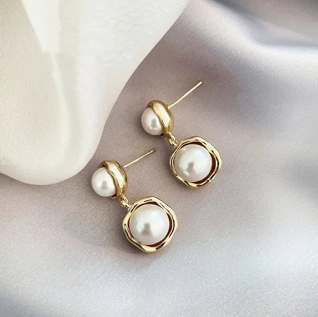Elegant Dangle Earrings with Pearls and Wavy Frame