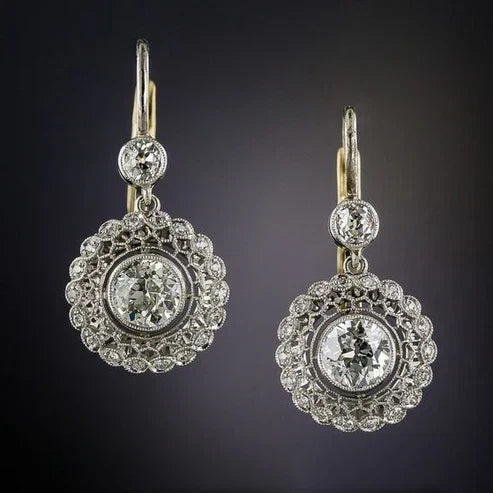 Vintage diamond earrings with a mandala design and cubic zirconia