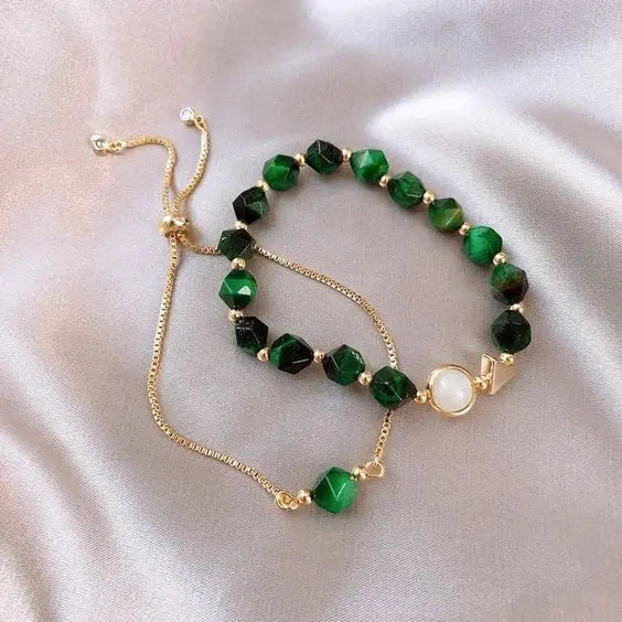 Elegant green cat's-eye bead bracelet with an adjustable chain