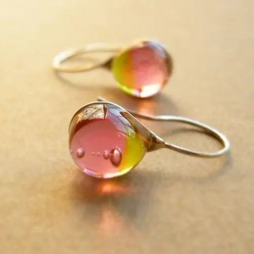 Vintage earrings with warm, gradient-coloured glass drops