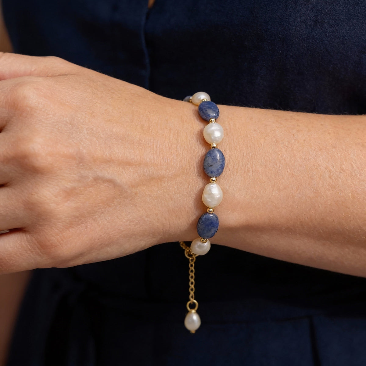 An elegant bracelet featuring freshwater pearls and sodalite gemstones