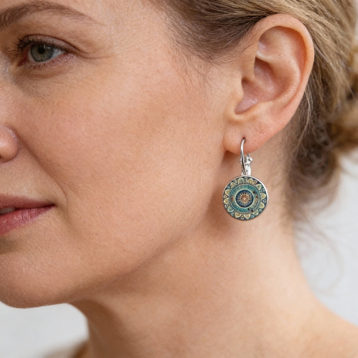 Vintage round mandala earrings with turquoise and gold detailing