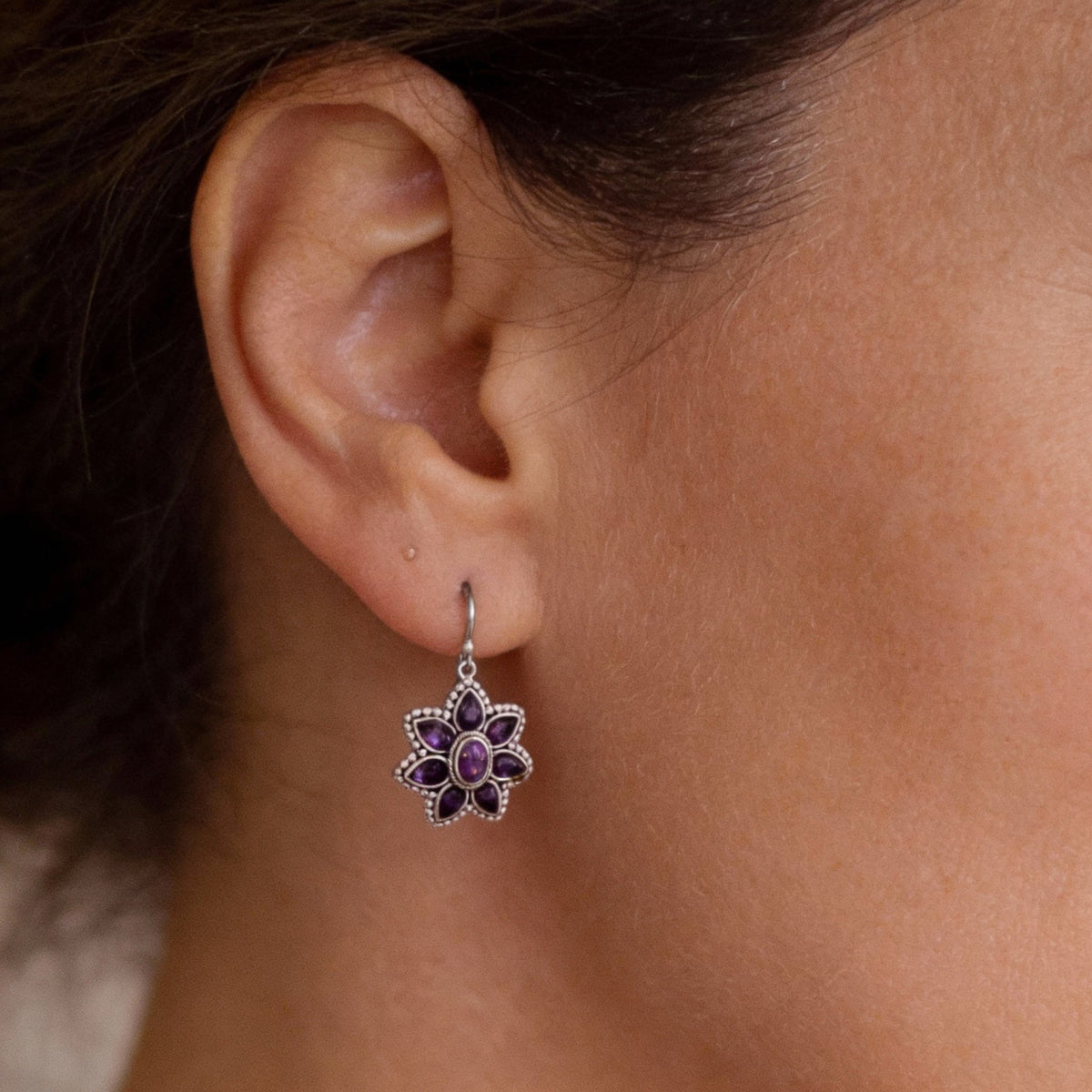 Vintage flower earrings with amethyst stones in an antique style