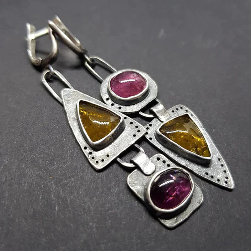 Eye-catching handmade earrings featuring natural gemstones and a vintage charm