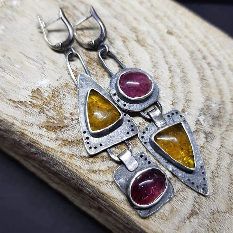 Eye-catching handmade earrings featuring natural gemstones and a vintage charm