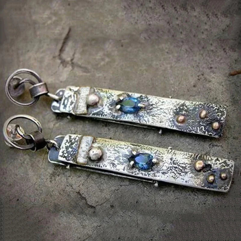 Handmade rustic long earrings with blue stones