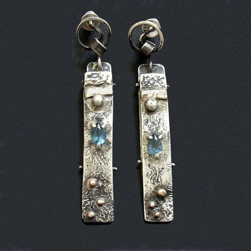 Handmade rustic long earrings with blue stones