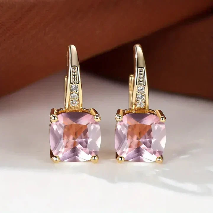 Sparkling hoop earrings with cushion-cut cubic zirconia