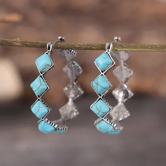 Turquoise geometric boho hoop earrings with a stone border