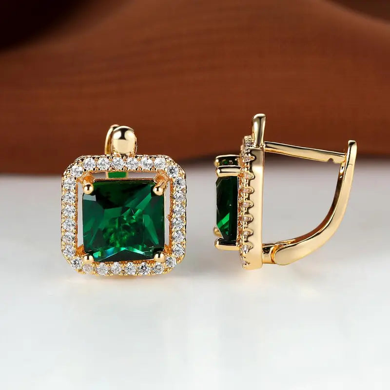 Glamorous earrings with square green cubic zirconia and a rhinestone crown