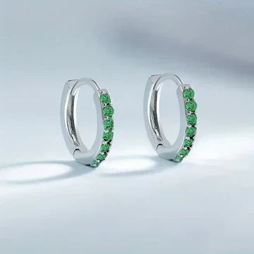 Shiny fold-over hoop earrings with coloured cubic zirconia: versatile and elegant