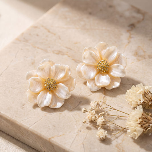 Flower earrings with delicate petals and a filigree centre