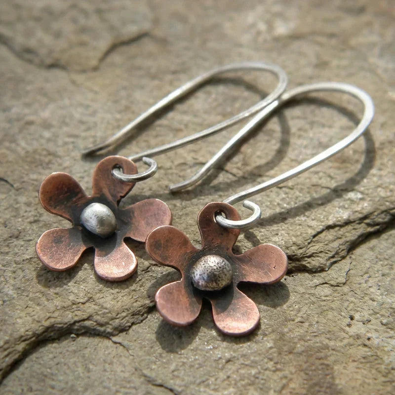 Handmade copper flower earrings with rustic bead detailing