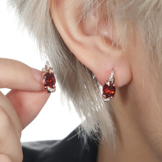 Sparkling ruby earrings with cubic zirconia detailing, perfect for special occasions