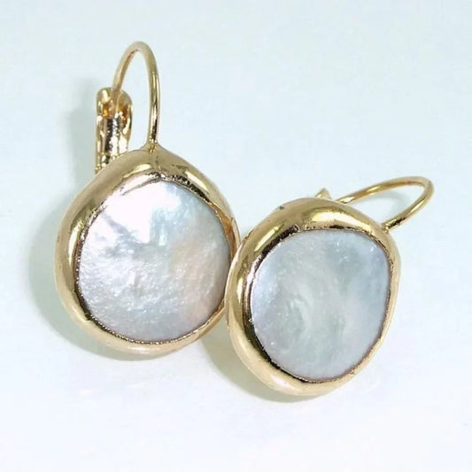 Elegant pearl earrings with a gold-plated setting and clasp