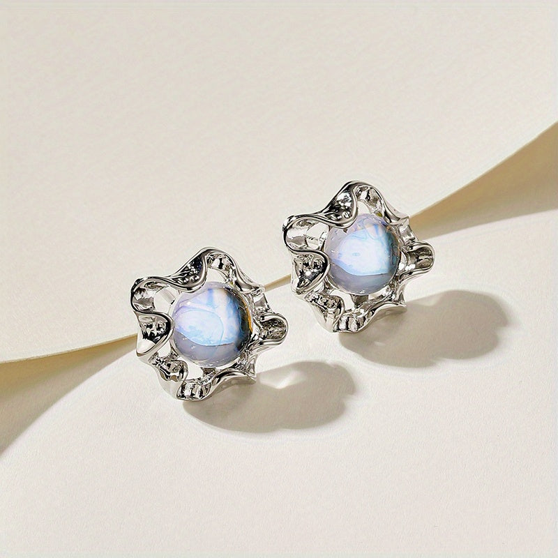 Moonstone earrings with an organic, wavy design