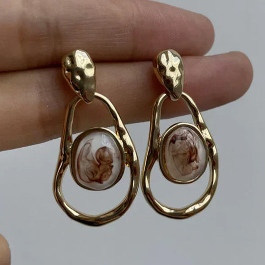 Organic resin stone earrings with a unique curved design