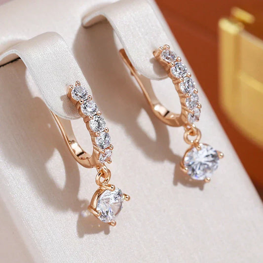 Hoop earrings with sparkling cubic zirconia and teardrop pendant for women