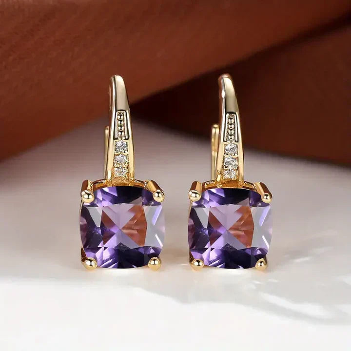 Sparkling hoop earrings with cushion-cut cubic zirconia