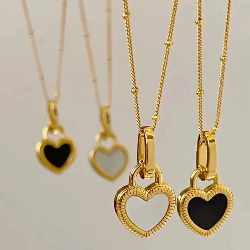 Gold Necklace with Black and White Heart Pendant