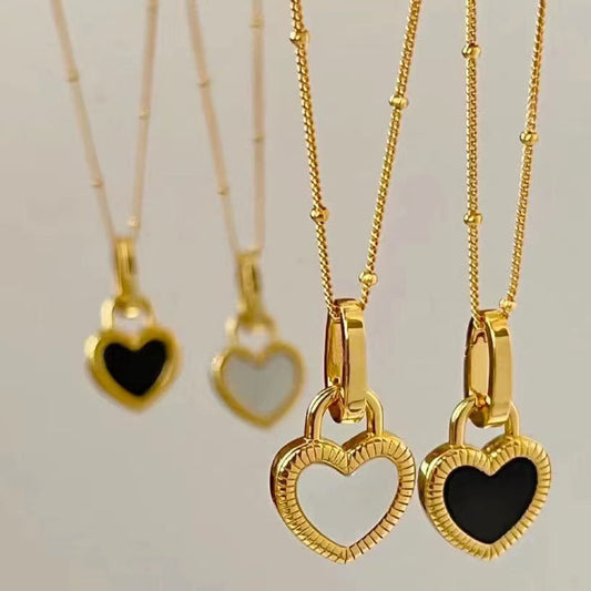 Gold Necklace with Black and White Heart Pendant