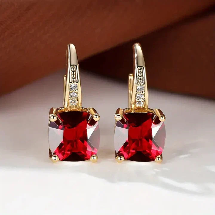 Sparkling hoop earrings with cushion-cut cubic zirconia