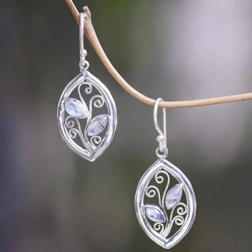 Silver colored moonstone earrings with floral hooks