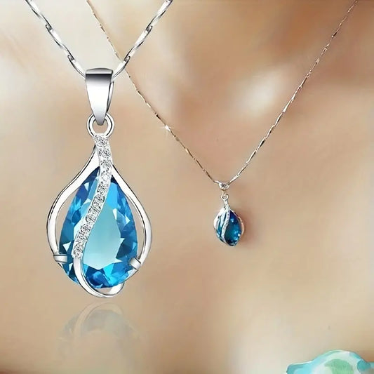 Elegant Necklace with Blue Aquamarine Drops and Cubic Zirconia Details