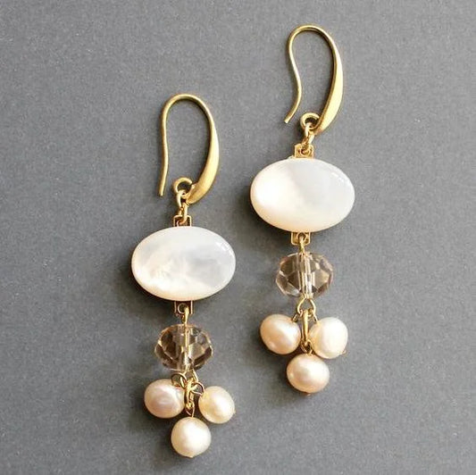 Elegant earrings featuring mother-of-pearl, smoky quartz and white freshwater pearls