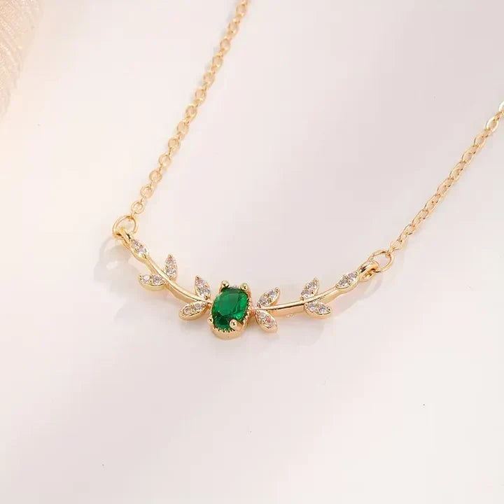 Delicate Necklace with Emerald Green Stone and Rhinestone Leaves